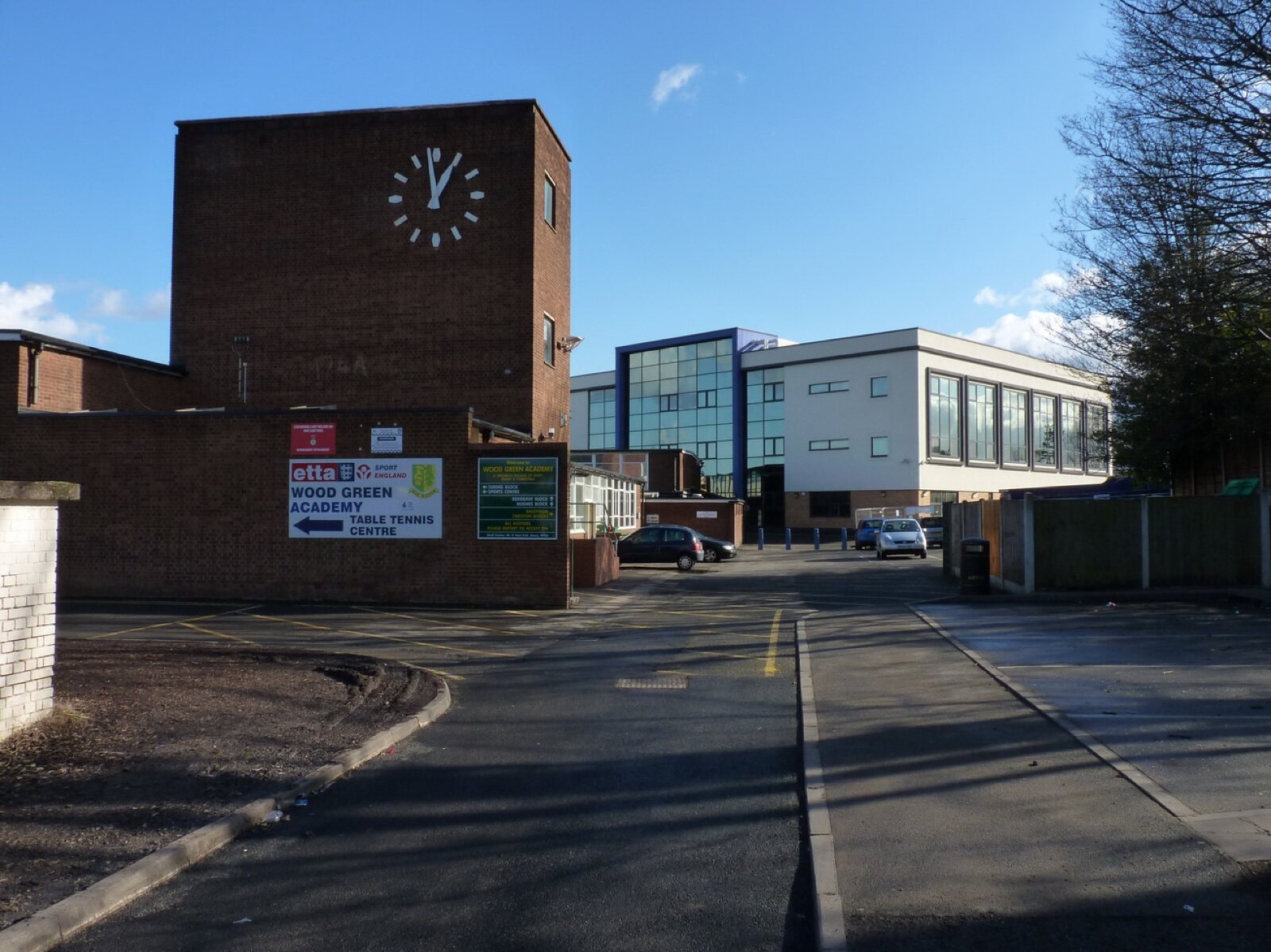 The entrance and clock tower of a secondary school in England